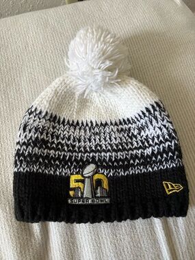 New Era Black & White Knit Pom Beanie with Yellow Super Bowl 50 Patch